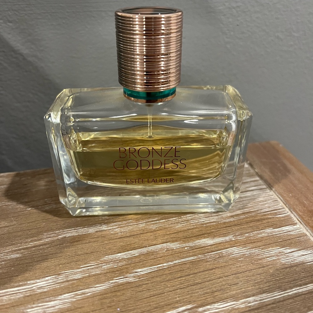 Half of Estée Lauder bronze goddess Perfume